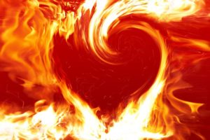 Fire blazing heart symbol. Love concept.